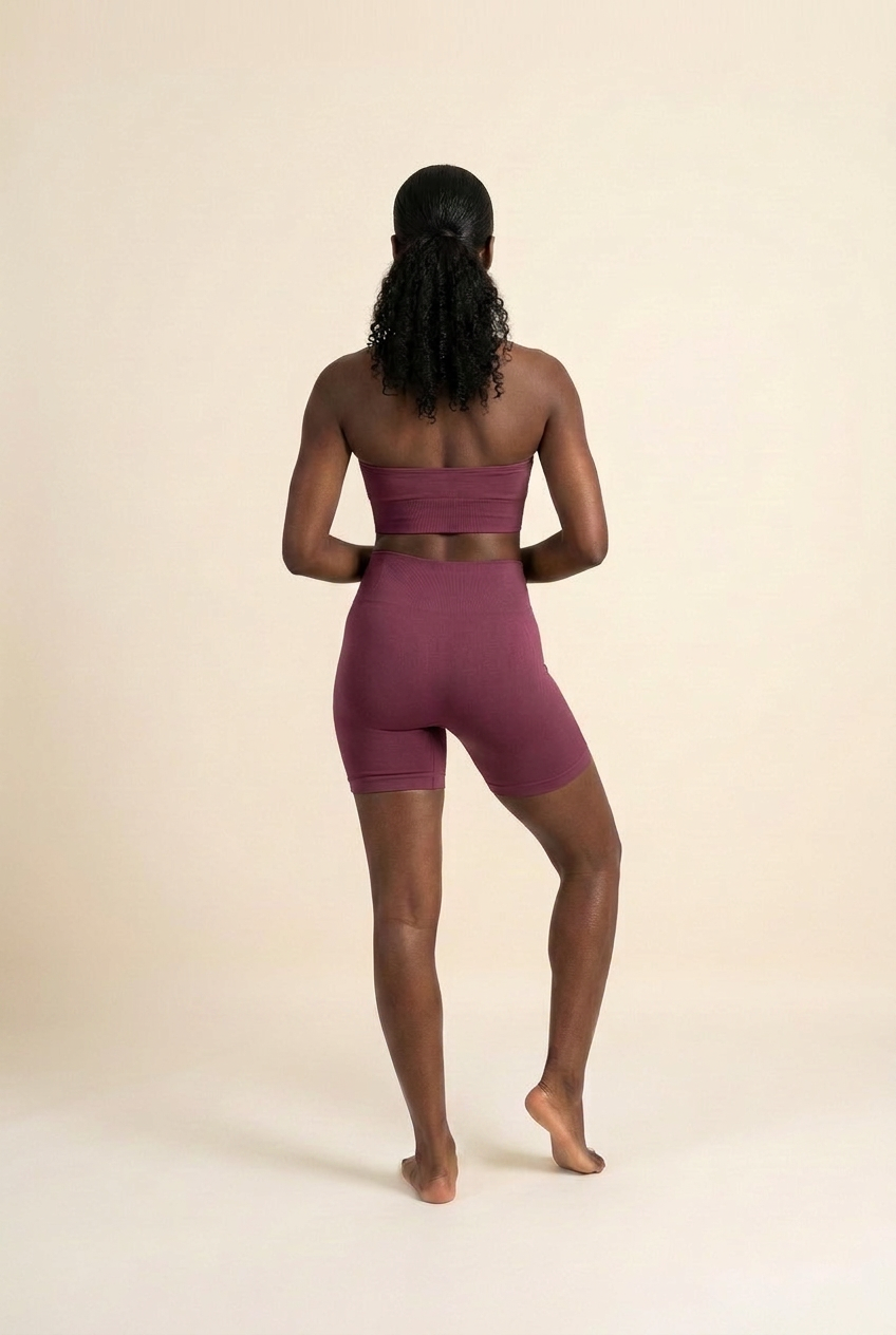 Kovelle halter vest gym set in winter berry, back view with halter straps, on model