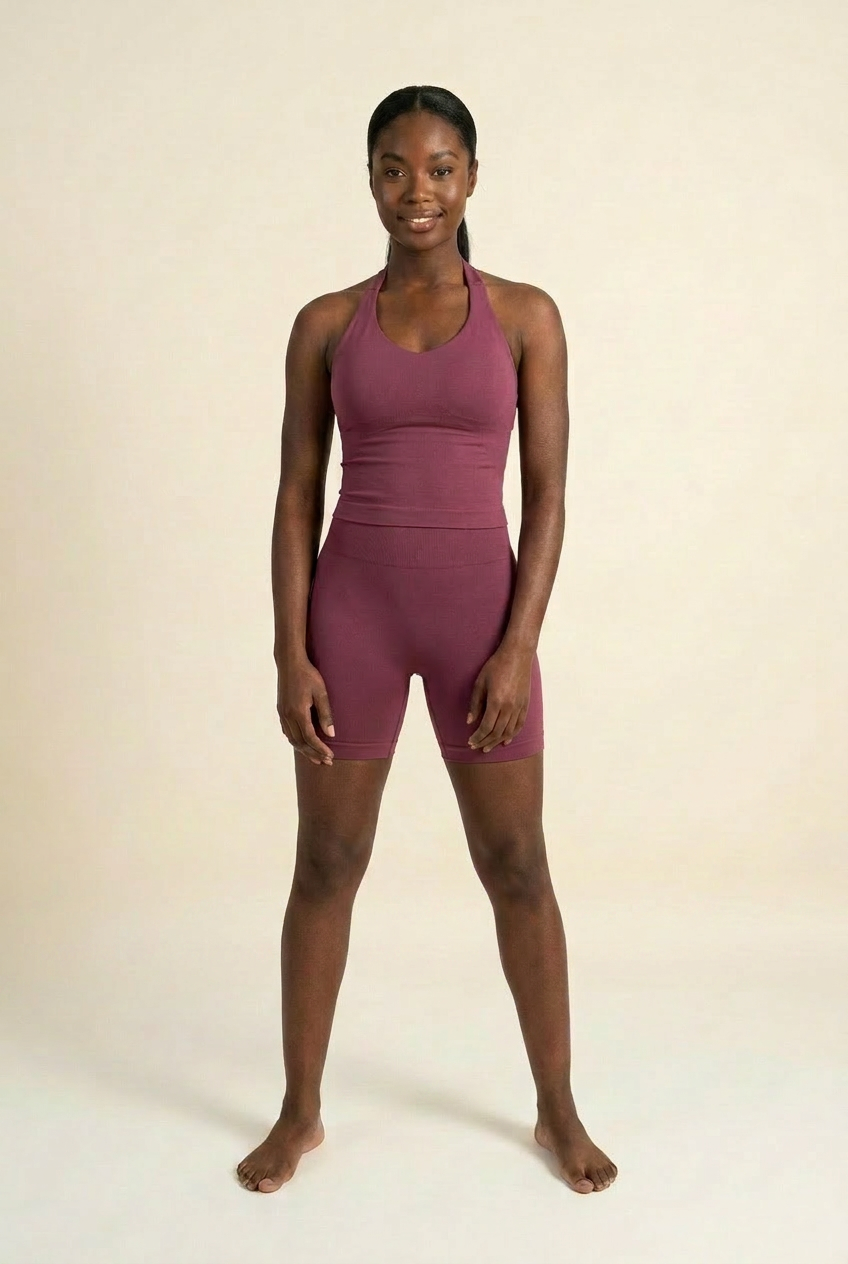 Kovelle halter vest gym set in winter berry, vest and fitted shorts, front on model