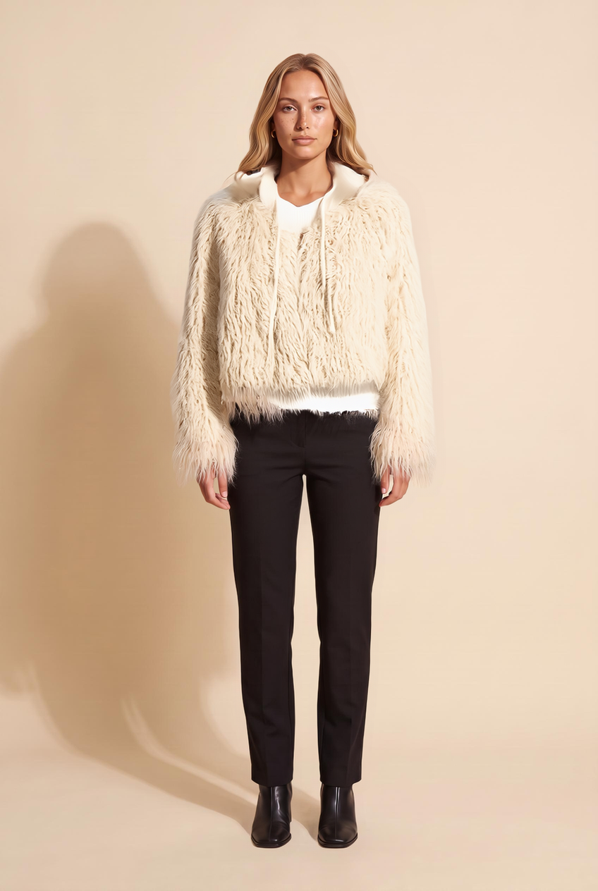 Kovelle hooded cropped faux fur jacket in cream, front view on model