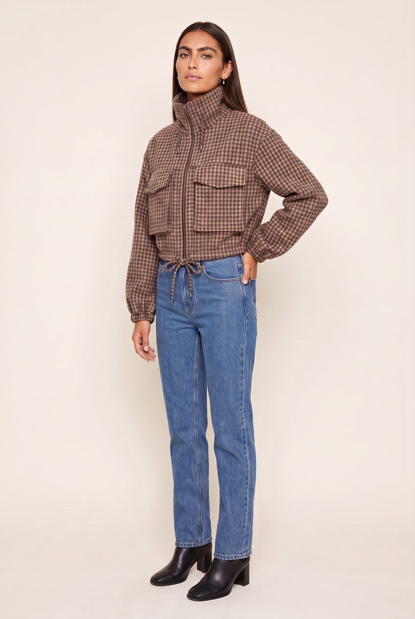 Kovelle houndstooth cropped bomber in brown houndstooth, three-quarter view on model