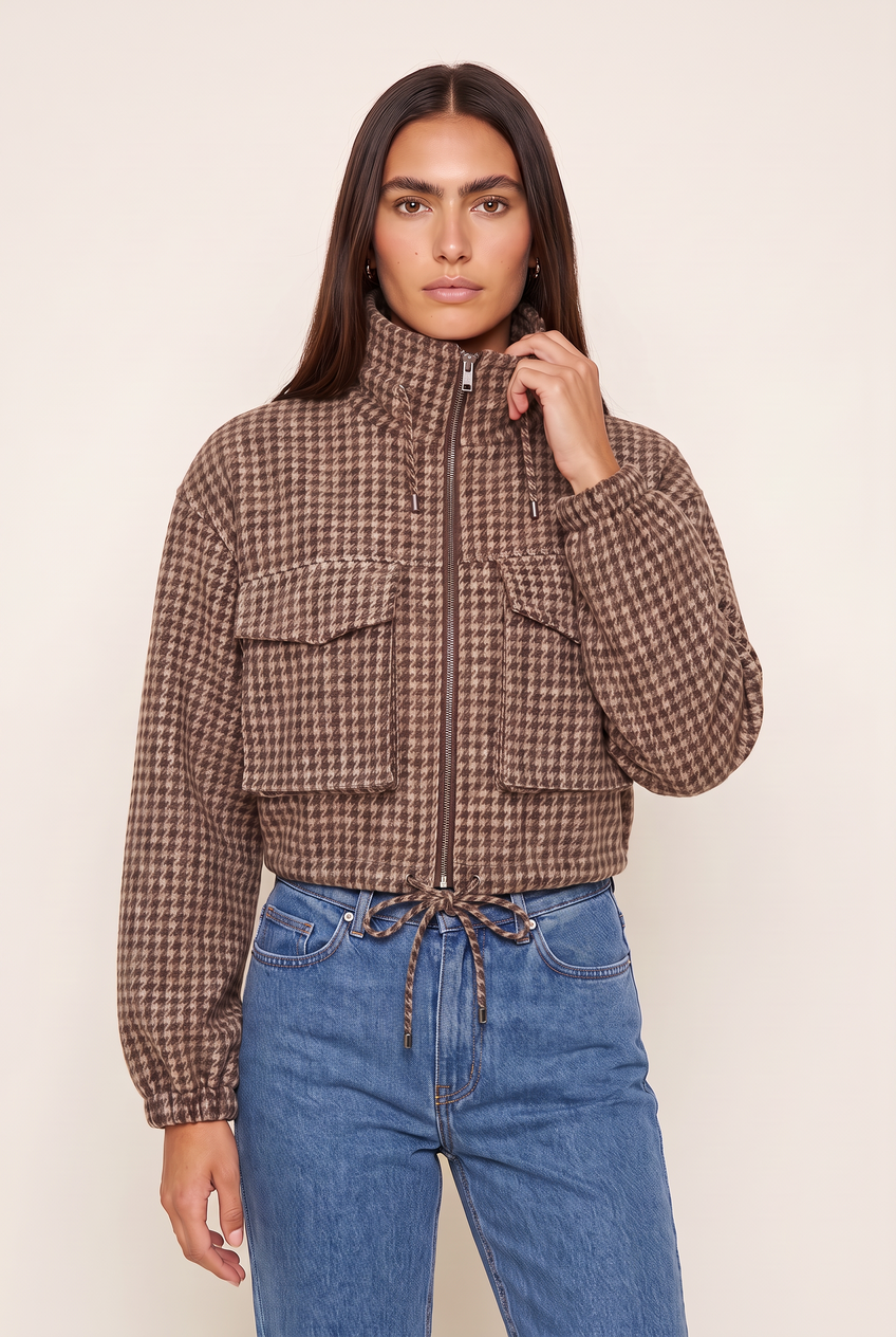 Kovelle houndstooth cropped bomber in brown houndstooth, close-up detail on model