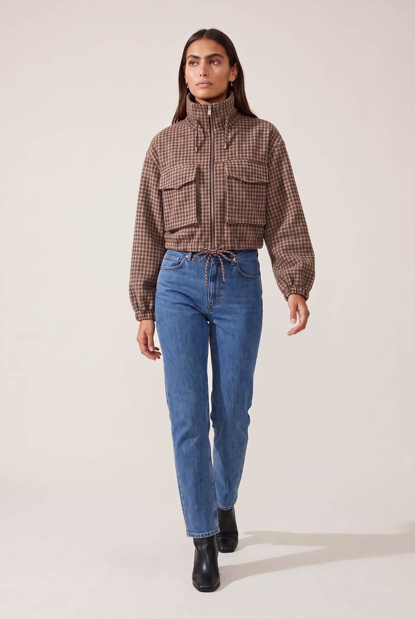 Kovelle houndstooth cropped bomber in brown houndstooth, walking, full length on model