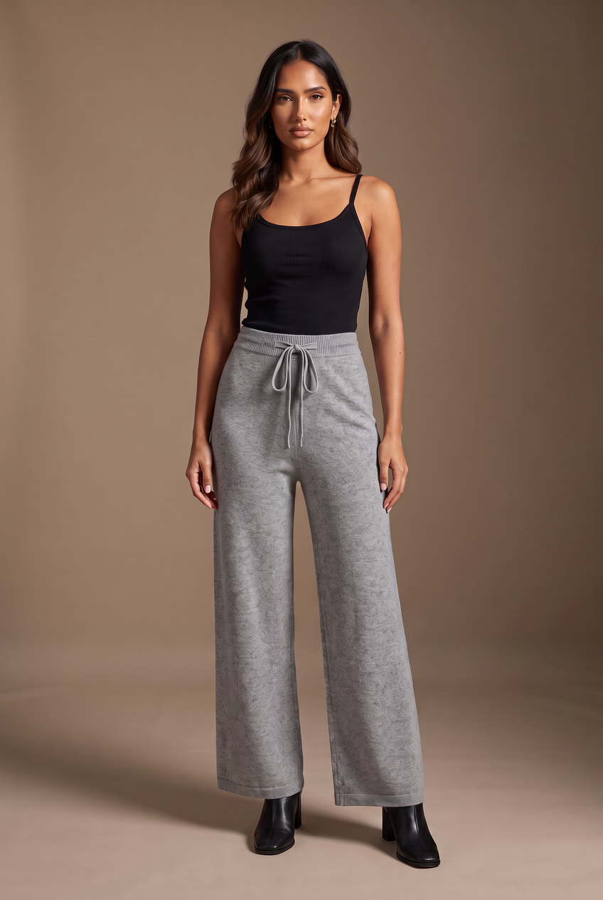 Kovelle knitted wide leg trousers in grey, front view on model