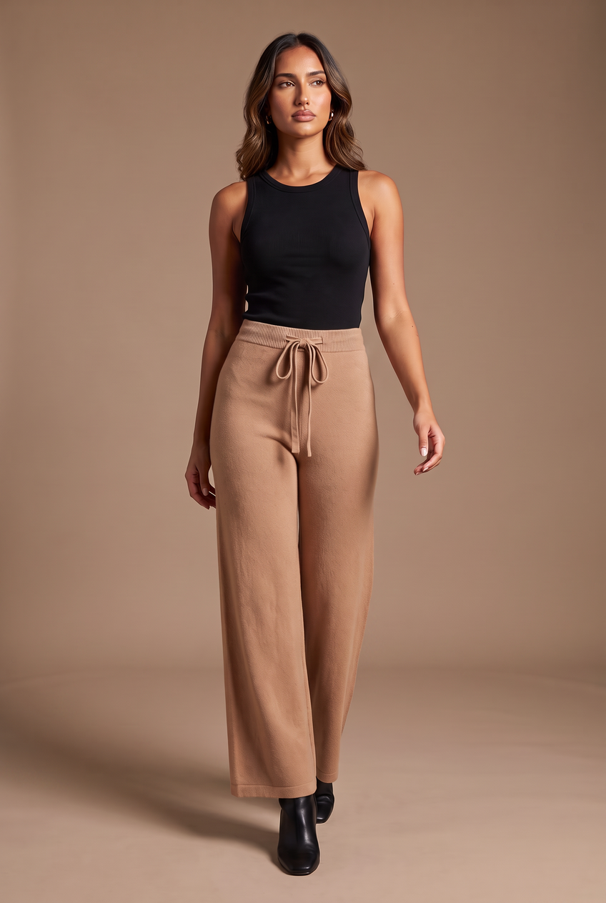 Kovelle knitted wide leg trousers in camel, walking, full length on model