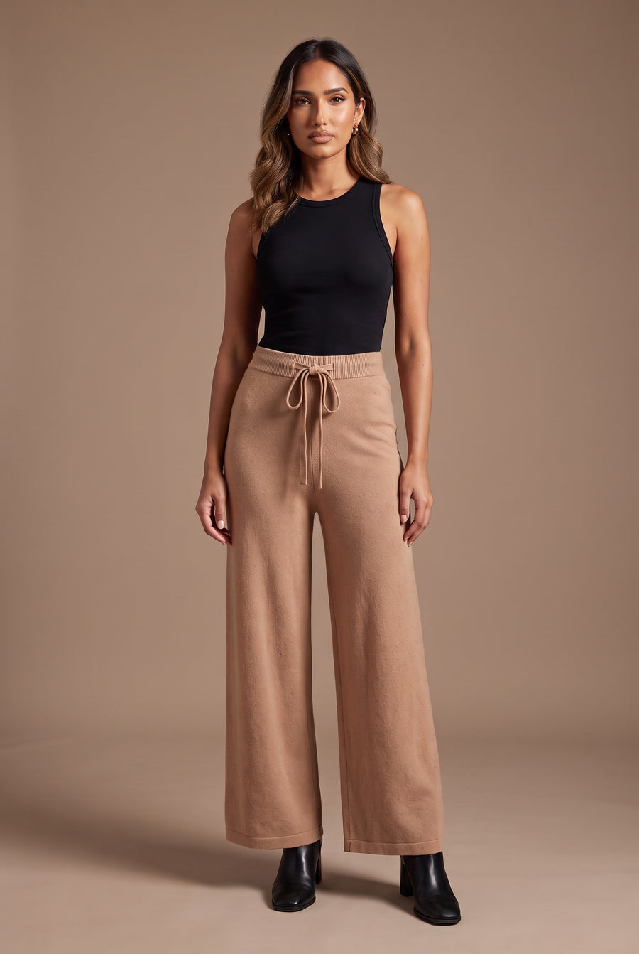 Kovelle knitted wide leg trousers in camel, front view on model