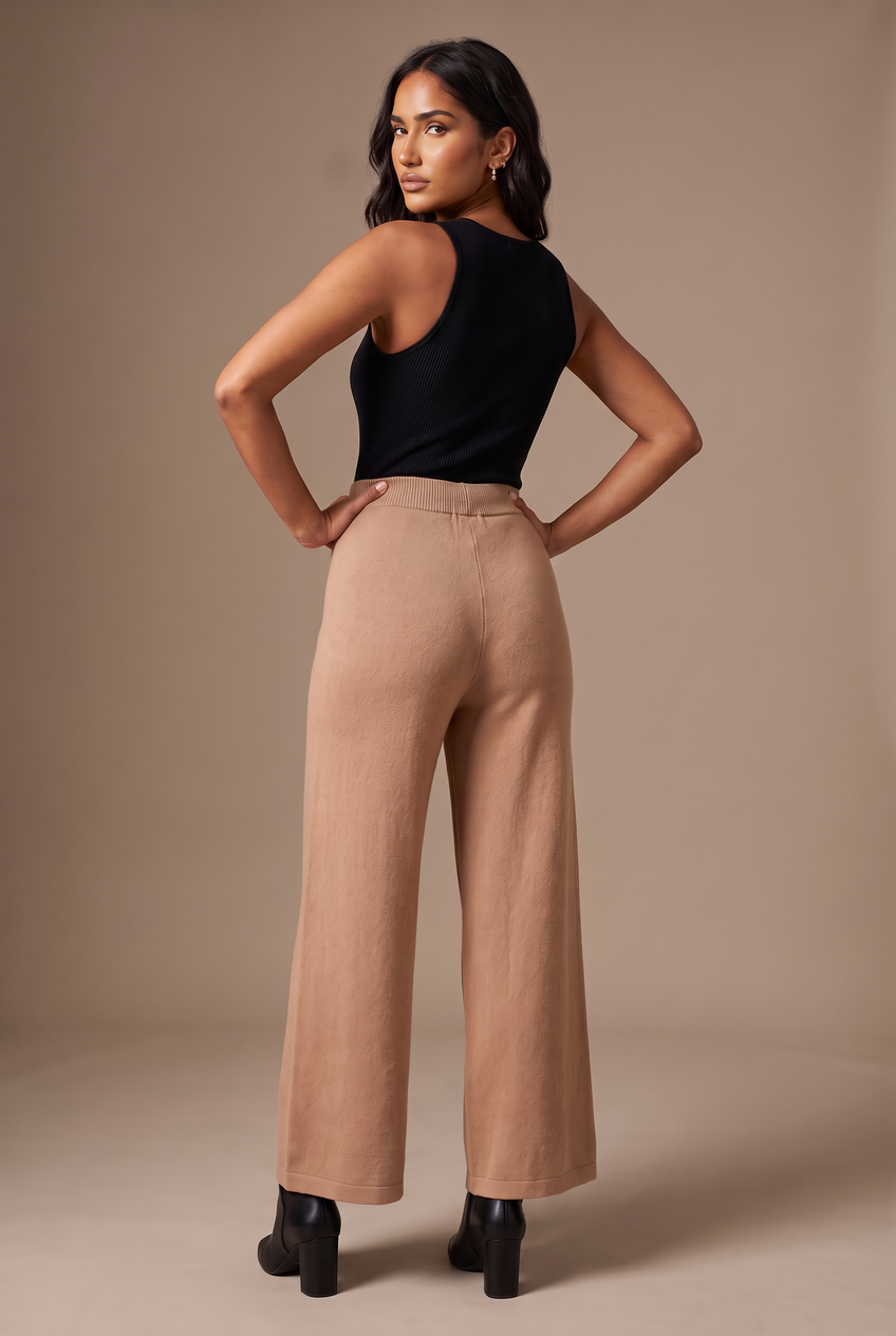 Kovelle knitted wide leg trousers in camel, back view on model