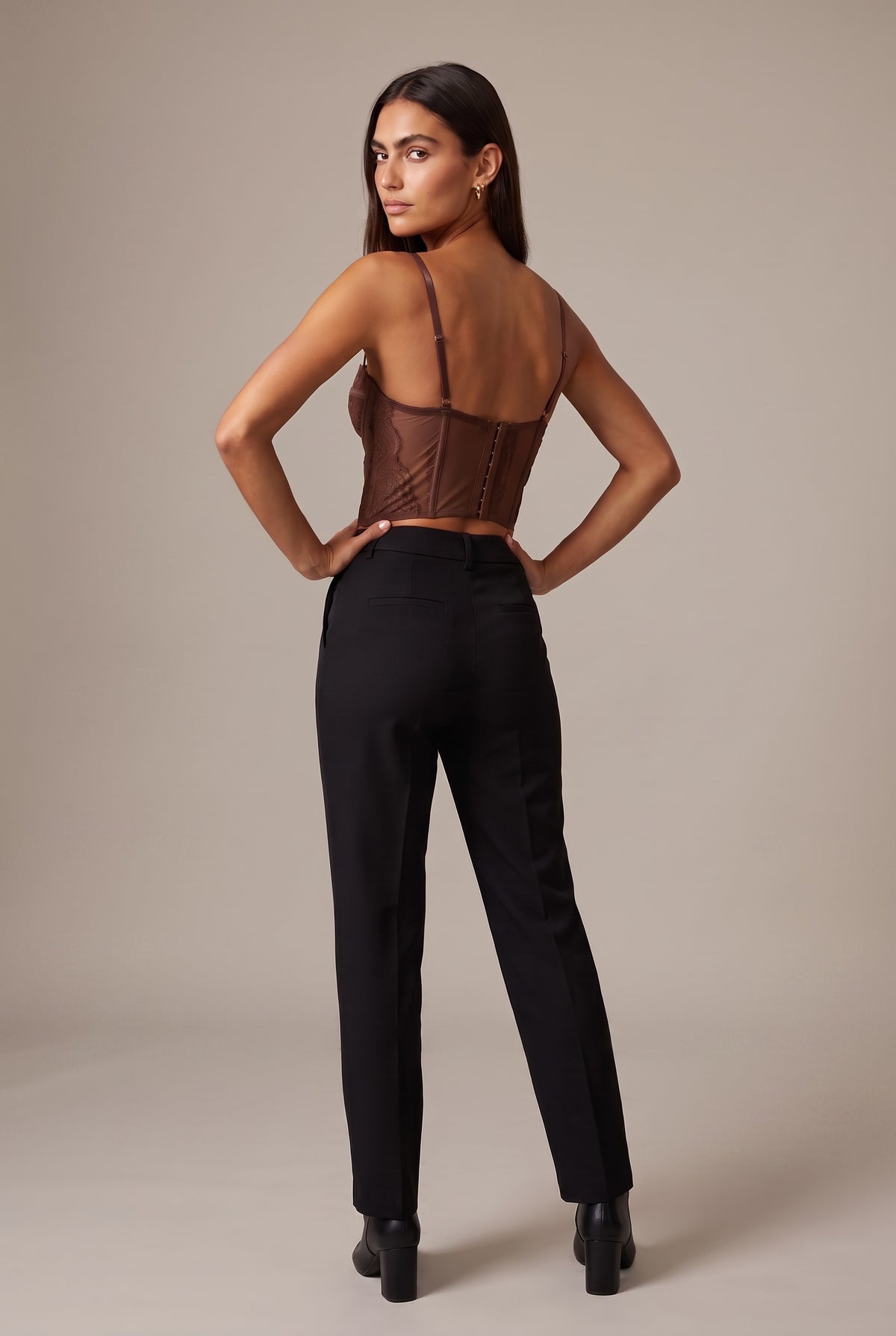 Kovelle lace bustier top in chocolate, back view on model