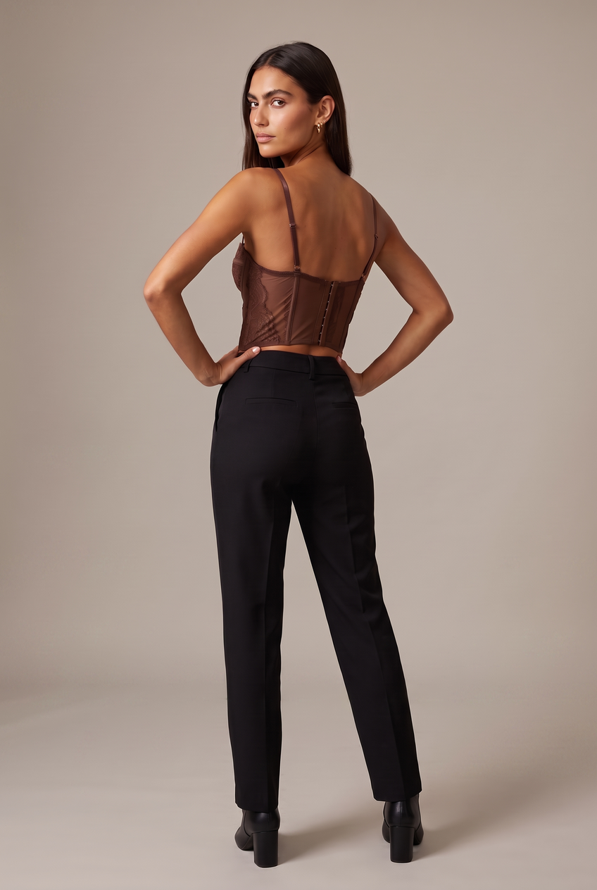 Kovelle lace bustier top in chocolate, back view on model