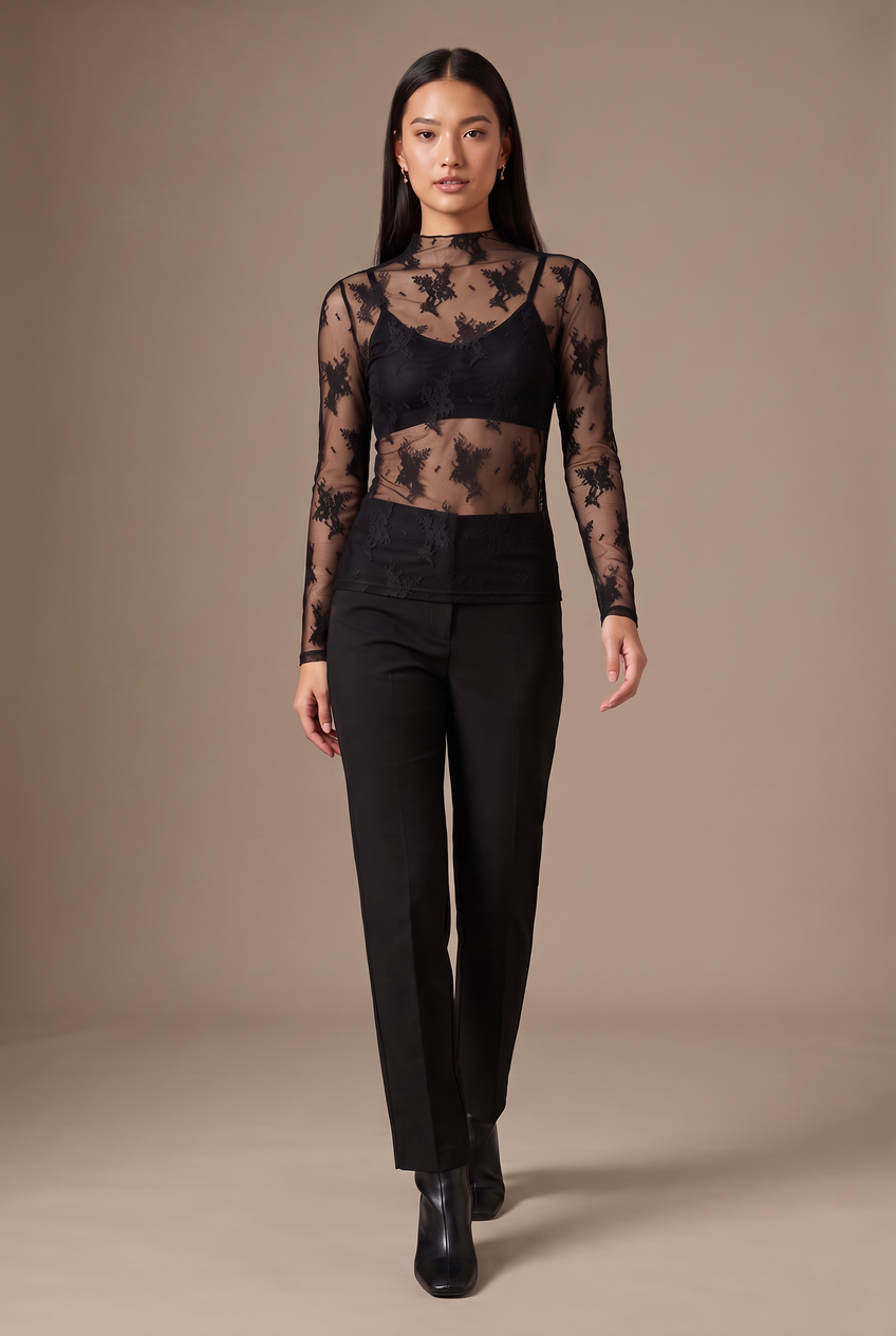 Kovelle lace high neck top in black, walking, full length on model