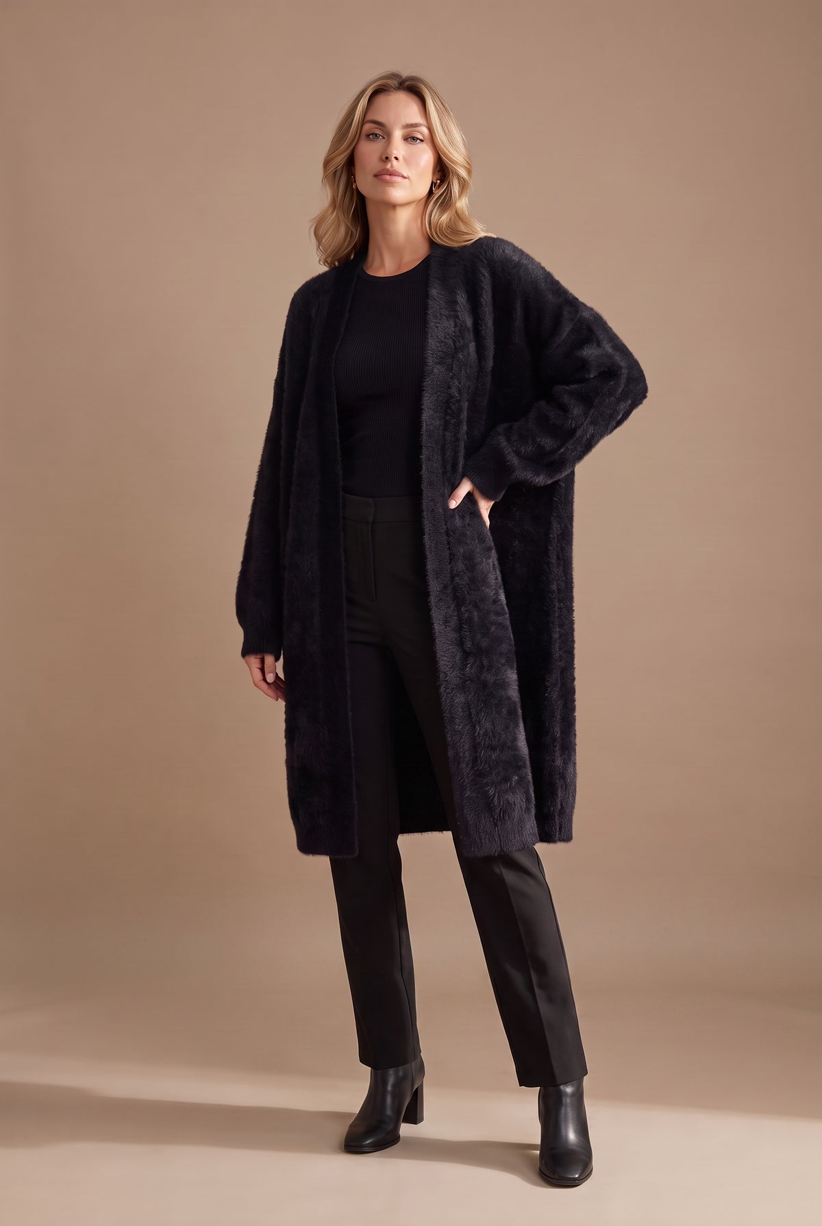 Kovelle longline fluffy cardigan in black, front view on model