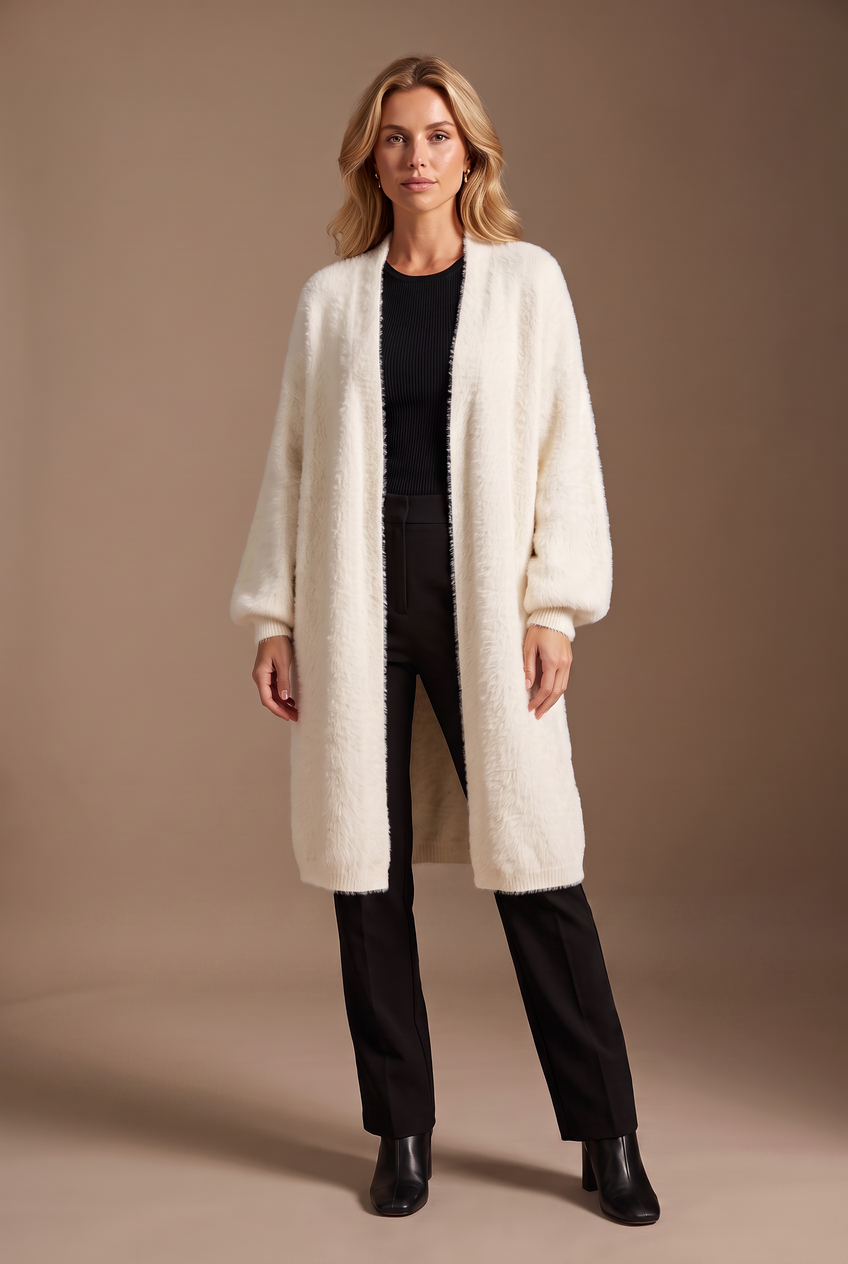 Kovelle longline fluffy cardigan in cream, front view on model