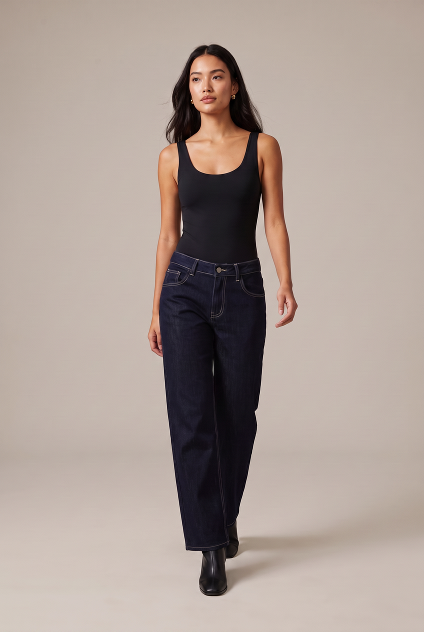 Kovelle low-rise wide leg jeans in indigo, walking, full length on model