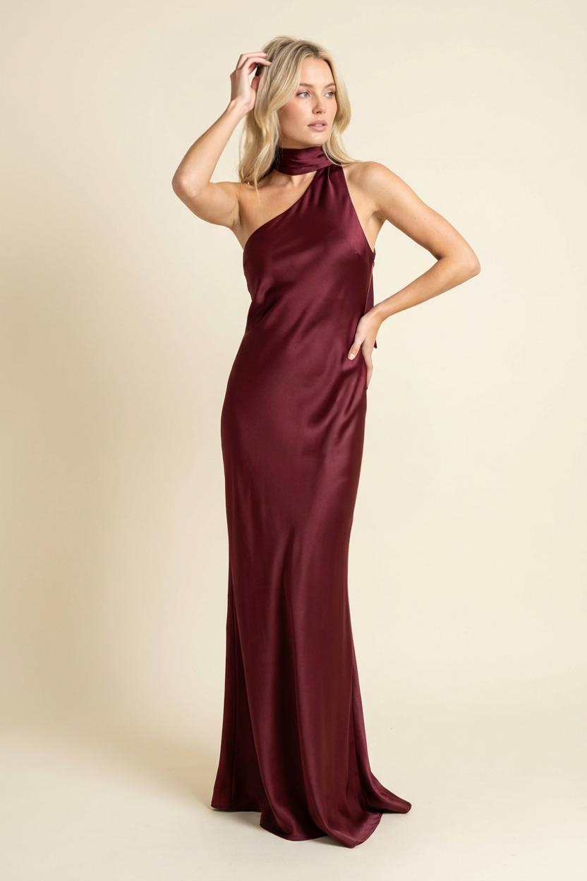 Kovelle one-shoulder satin scarf maxi dress in burgundy, side view, on model