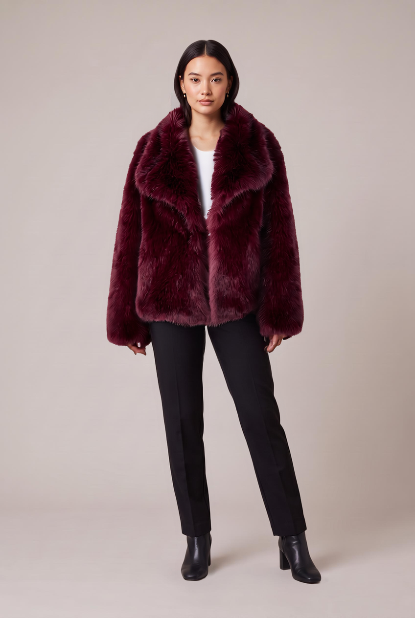 Kovelle oversized faux fur jacket in burgundy, front view on model