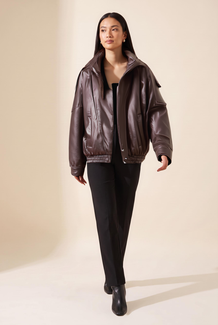Kovelle oversized faux leather jacket in chocolate, walking, full length on model