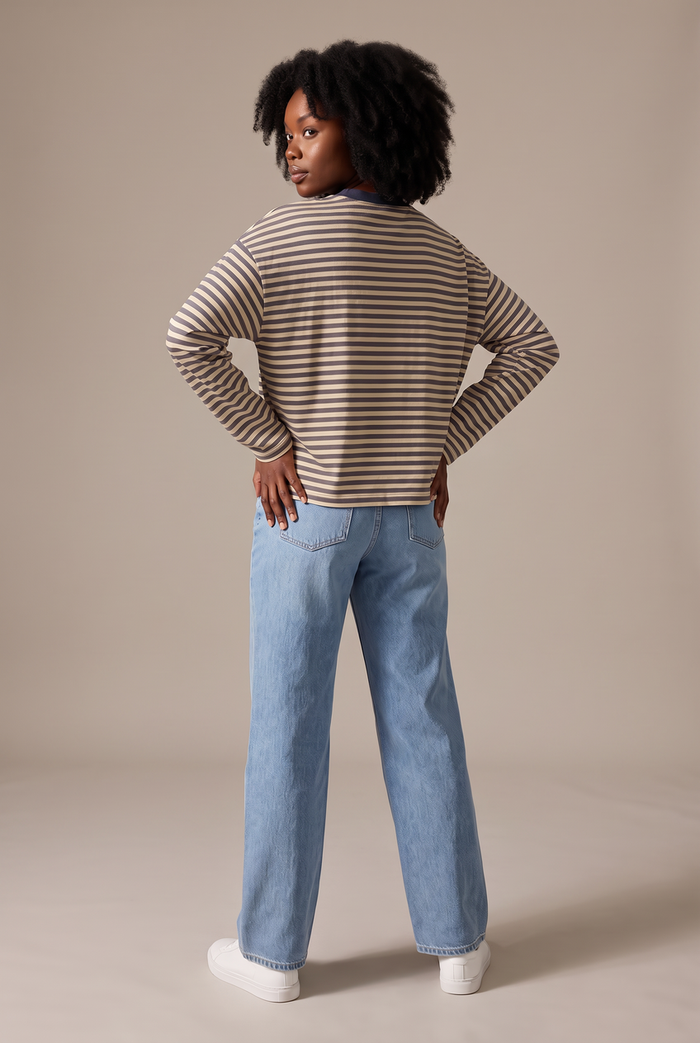 Kovelle oversized striped long sleeve tee in khaki stripe, back view on model