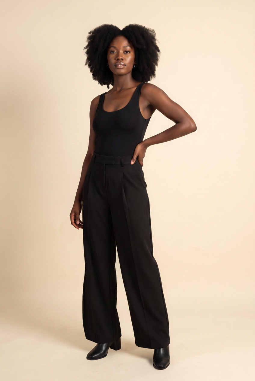 Kovelle pinstripe pleat-front trousers in black, front view on model