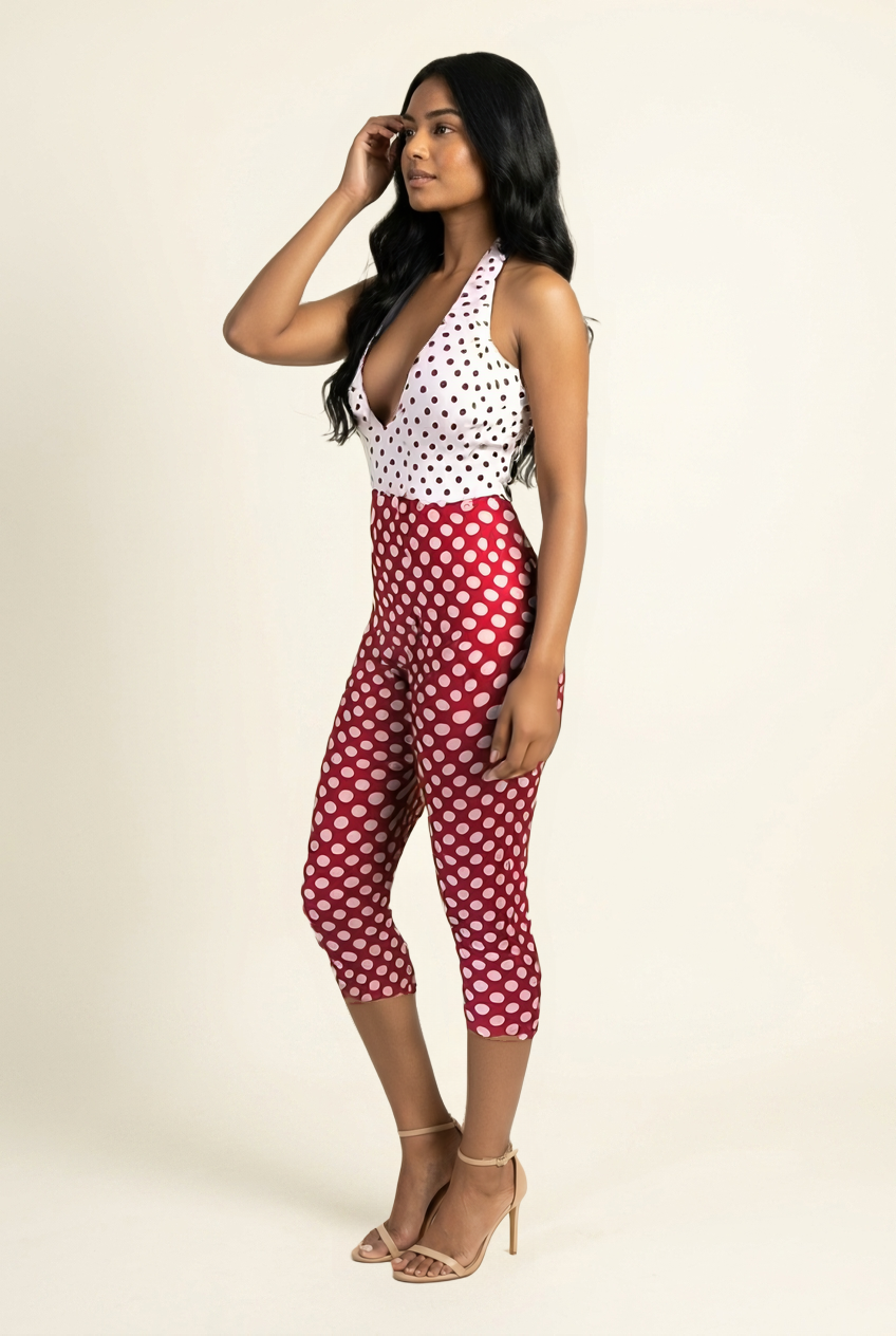 Kovelle polka dot halter capri jumpsuit in red, side view on model