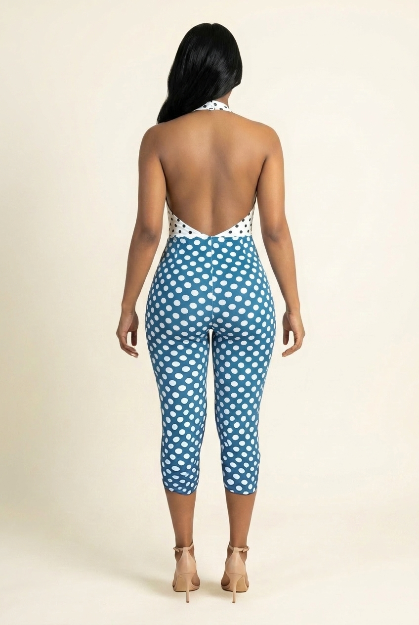 Kovelle polka dot halter capri jumpsuit in blue, open backless back on model