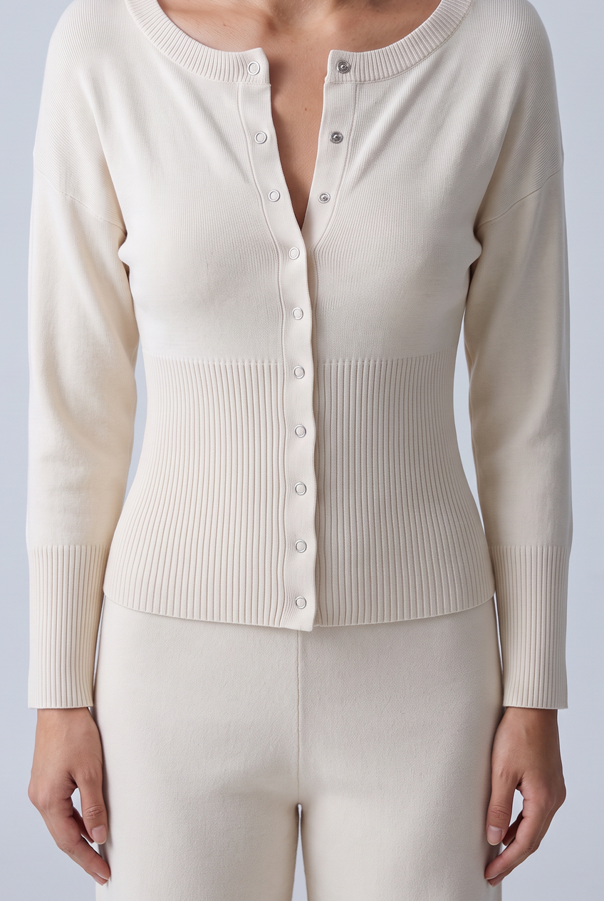 Kovelle rib snap button top in cream, close-up detail on model