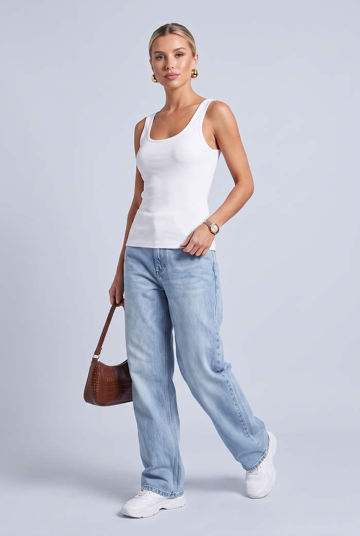 Kovelle scoop neck rib vest in white, full length on model