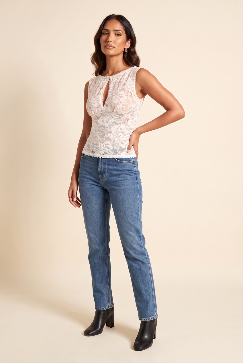 Kovelle sheer lace boat neck top in ivory, three-quarter view on model