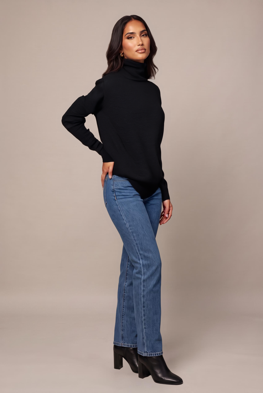 Kovelle sleeveless turtleneck knit in black, front view on model