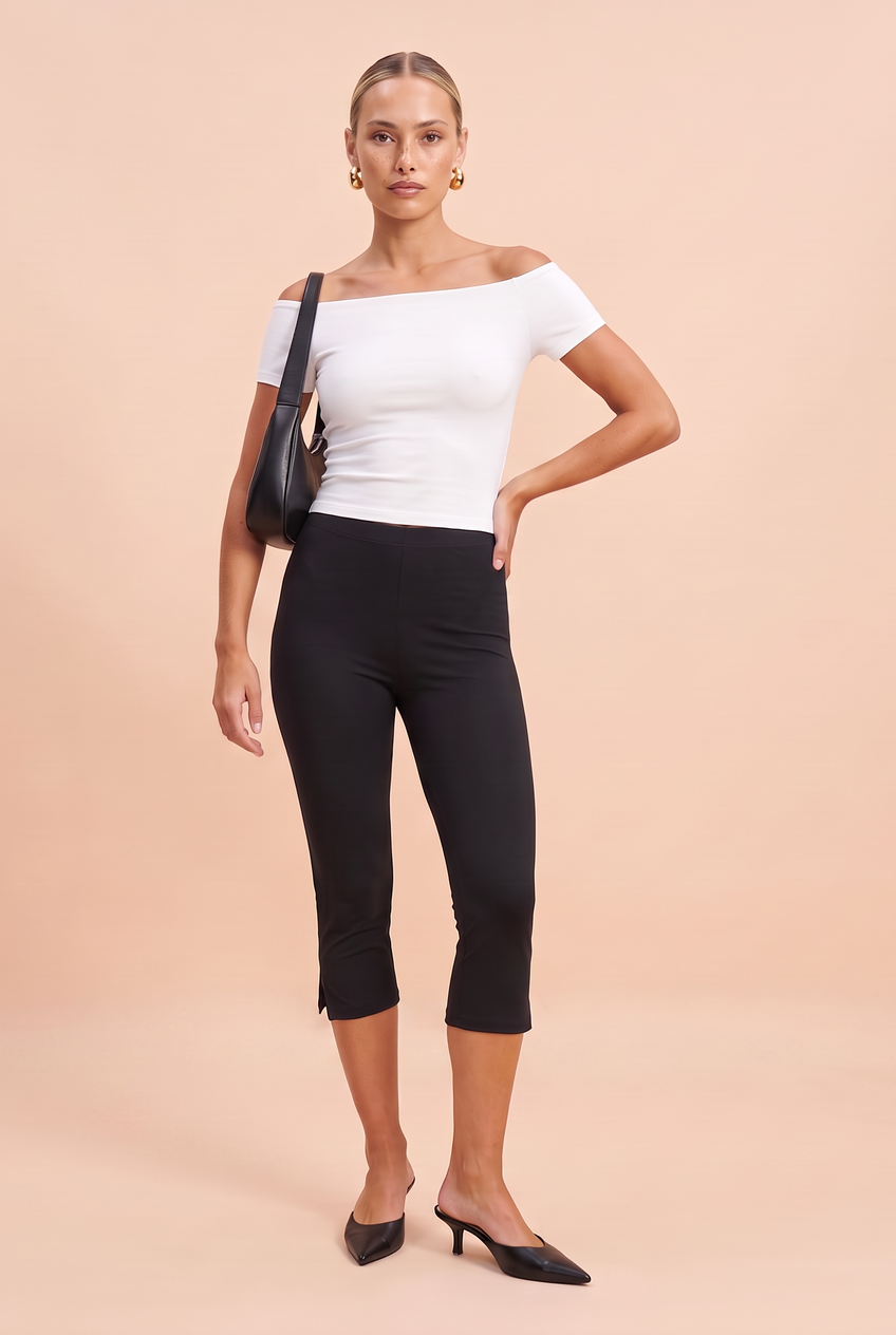 Kovelle split hem capri leggings in black, front view on model
