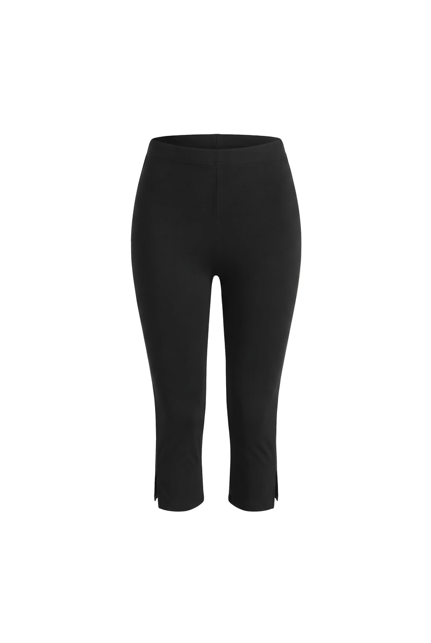 Kovelle split hem capri leggings in black, flat product view showing the full garment