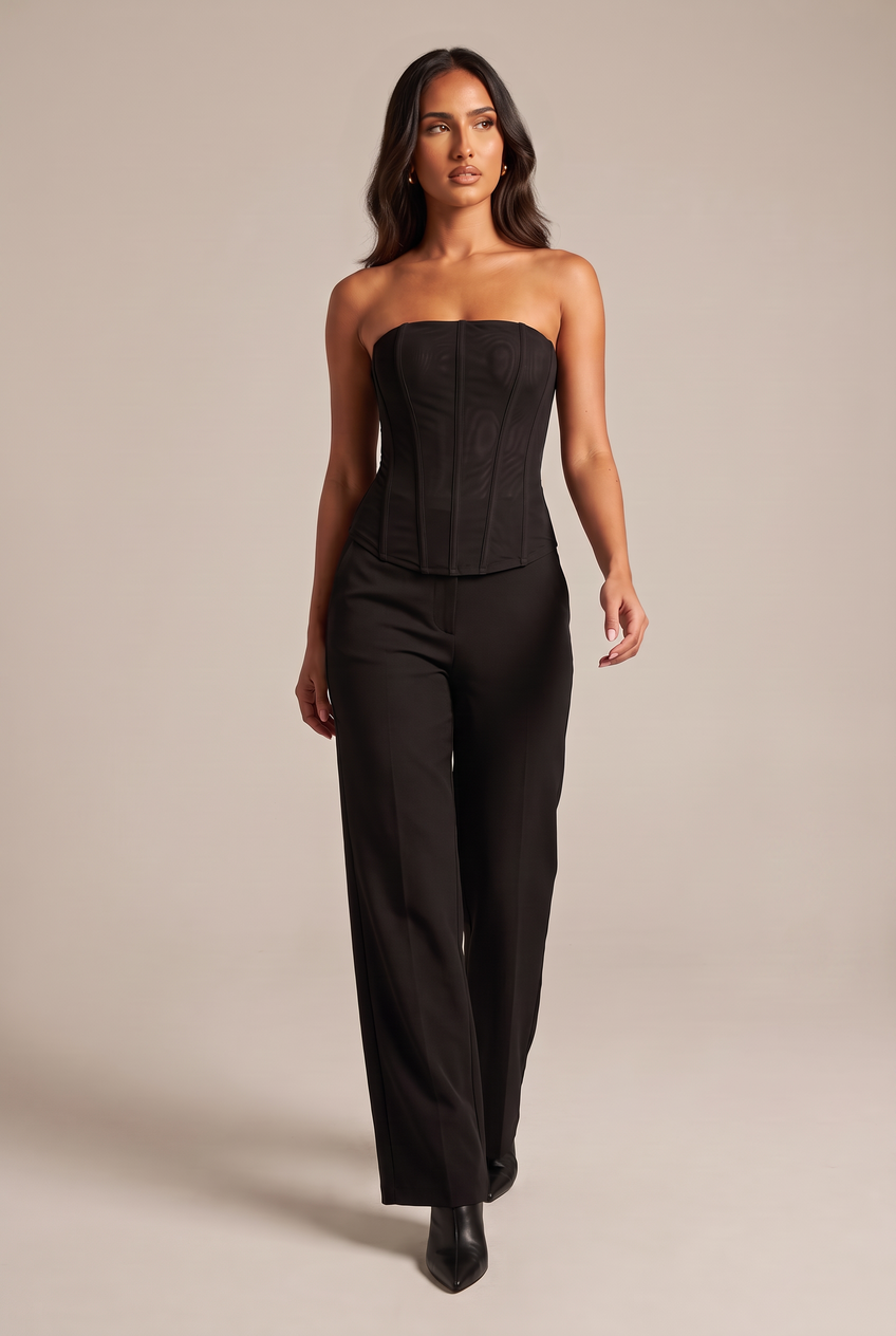 Kovelle strapless mesh bustier in black, walking, full length on model
