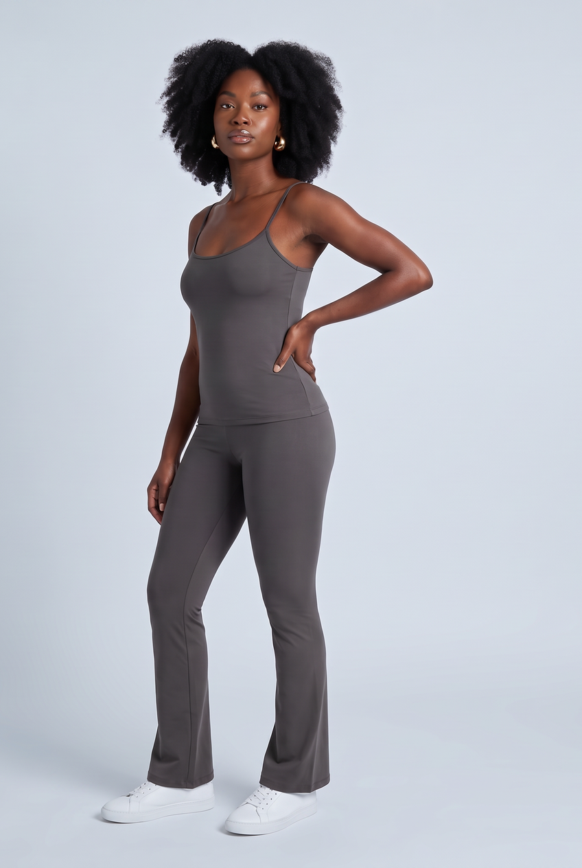 Kovelle strappy sculpt vest in dark grey, three-quarter view on model