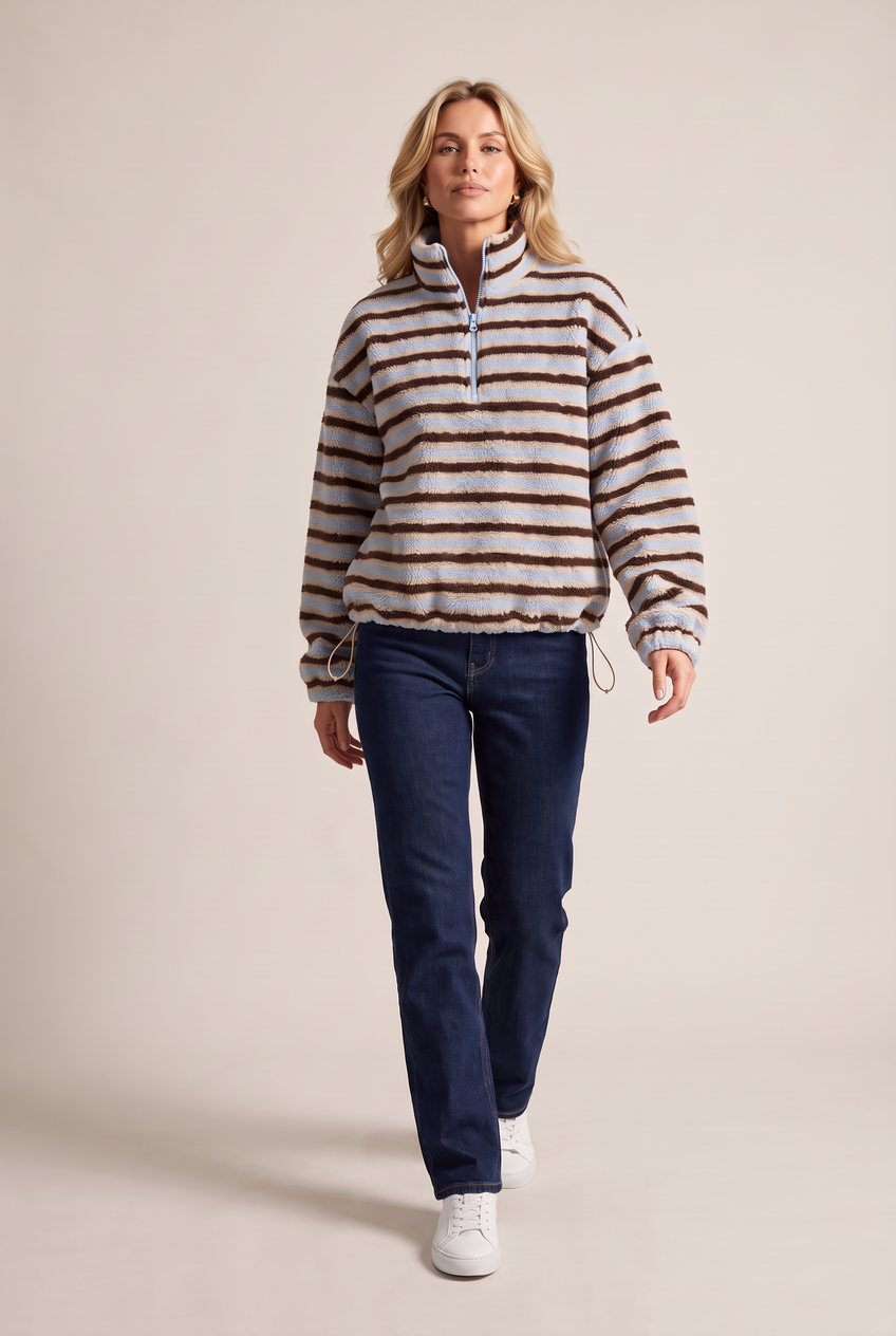 Kovelle striped sherpa half zip in blue stripe, walking, full length on model
