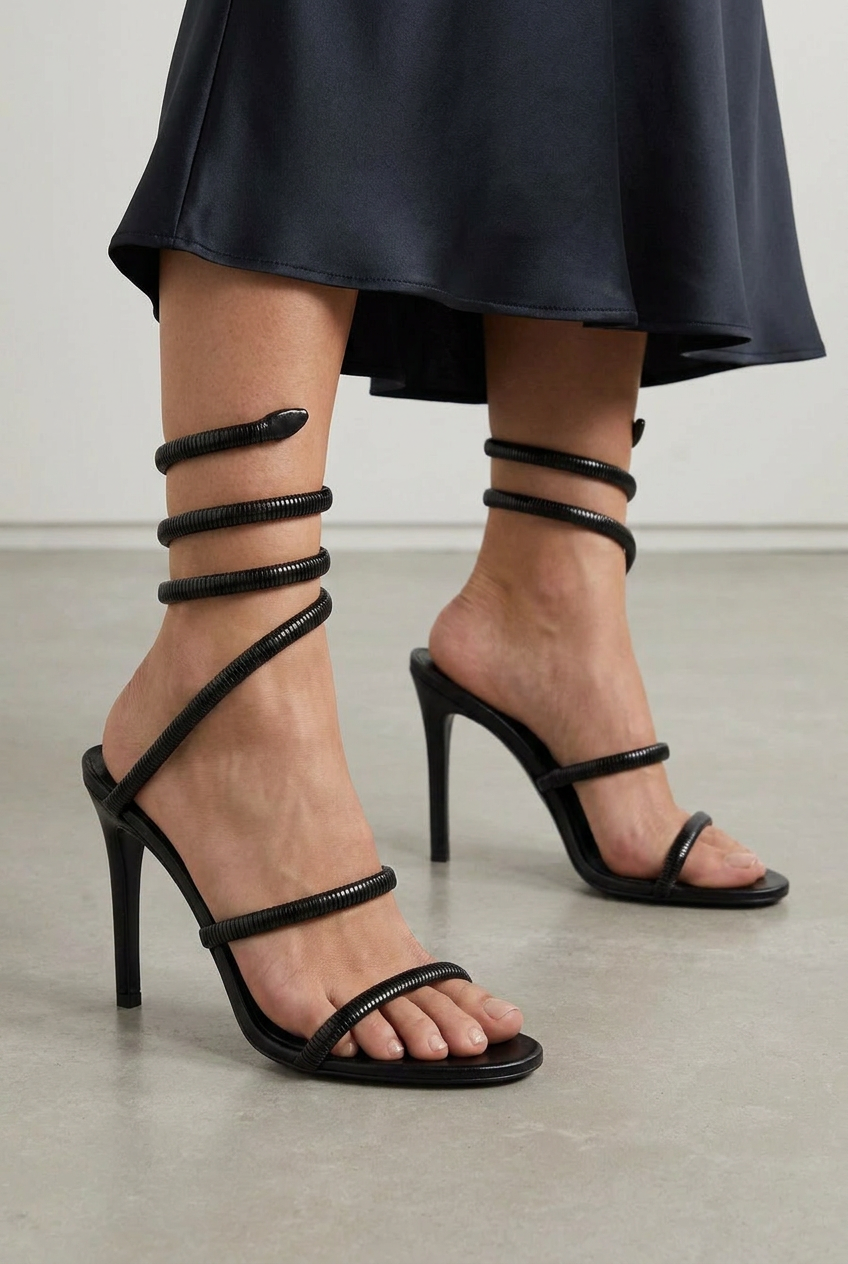 Coil Strap Heel in black, worn