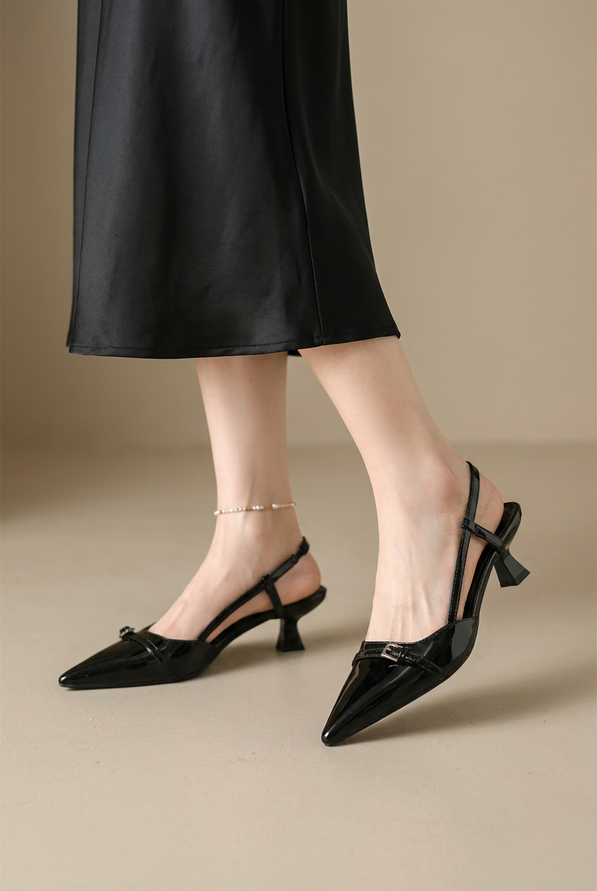 Slingback Kitten Heel in black, worn