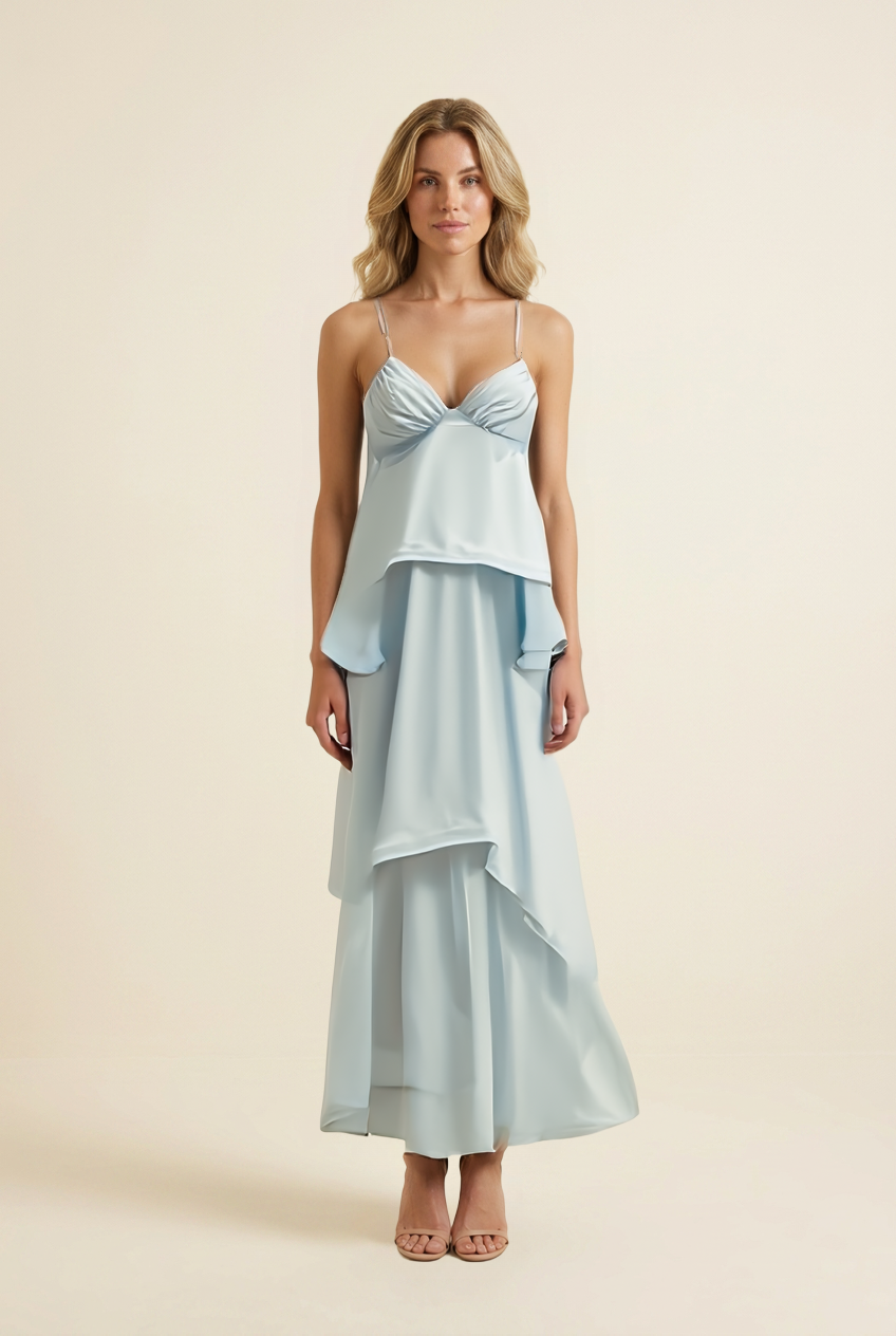 Kovelle tiered ruffle halter maxi dress in baby blue, ruched V neck bust, on model, front