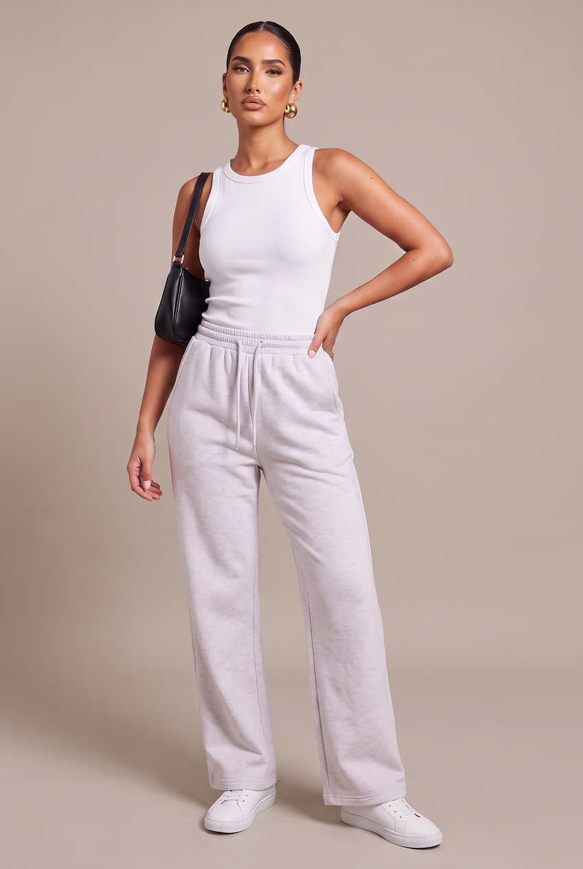 Kovelle wide leg joggers in light grey, three-quarter view on model