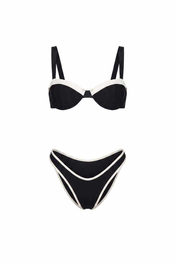The Kovelle Contrast Trim Bikini Set photographed on its own against a white background, showing the balconette top and white bound bottoms