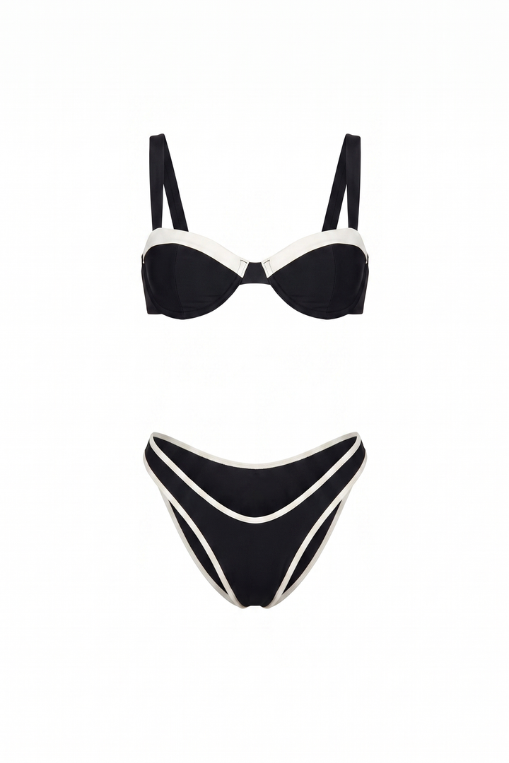 The Kovelle Contrast Trim Bikini Set photographed on its own against a white background, showing the balconette top and white bound bottoms