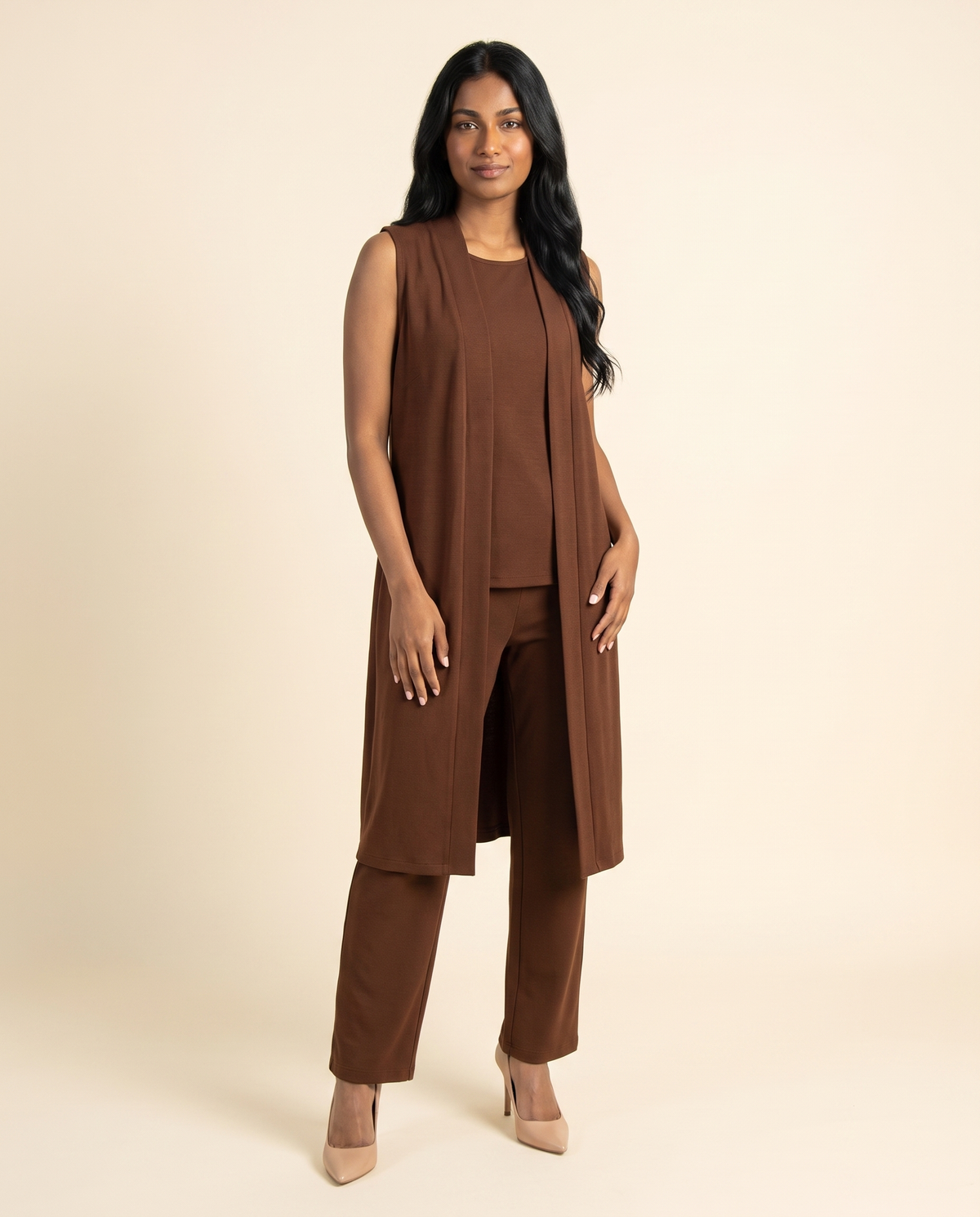 Kovelle chocolate waistcoat trouser set three quarter view, on model