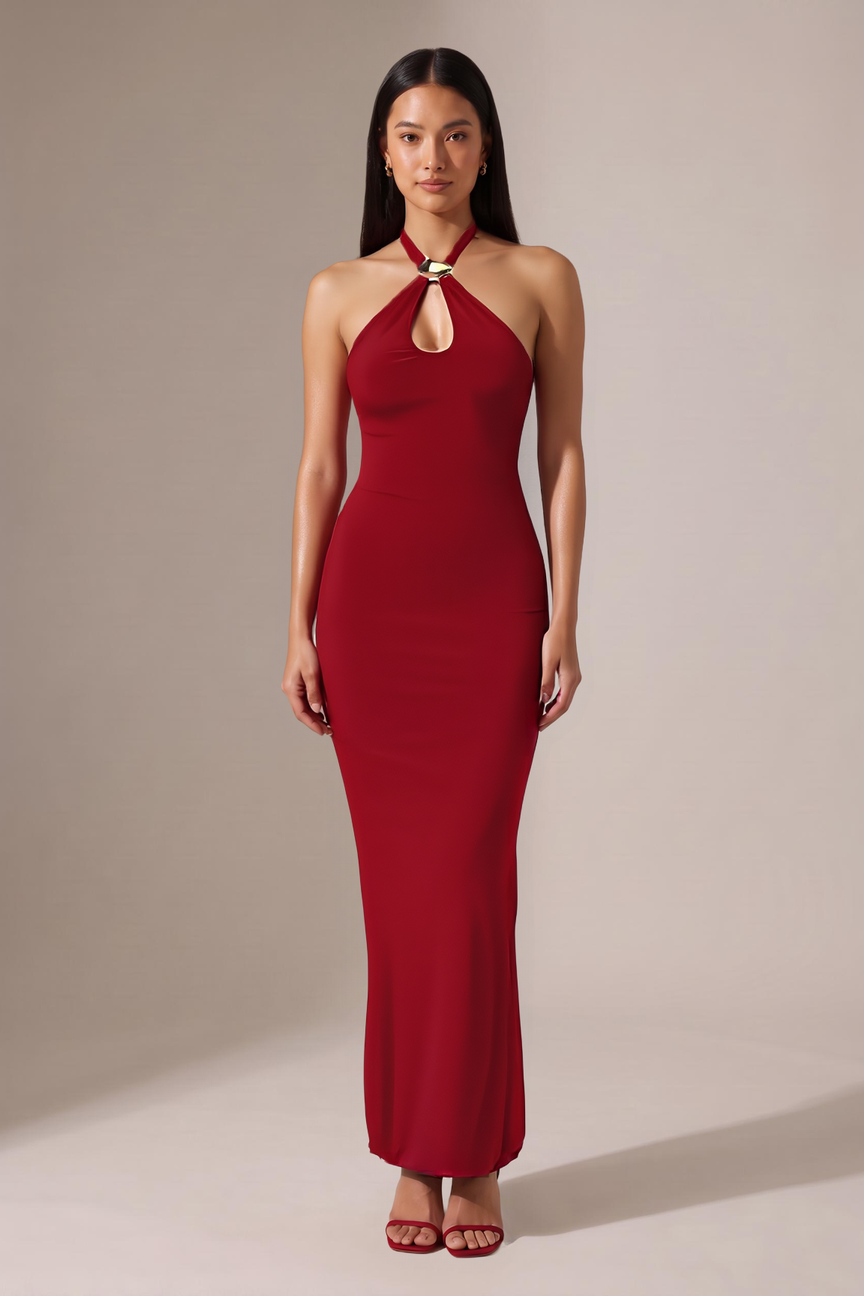 Model wearing the red halter keyhole maxi dress, front view