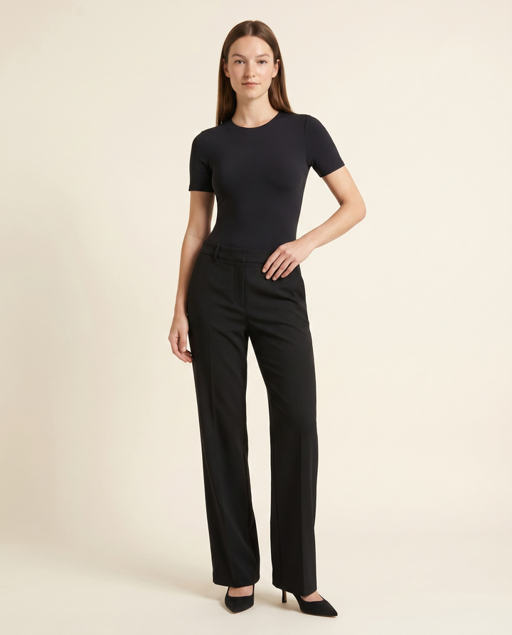 Kovelle black second skin bodysuit three quarter view, on model