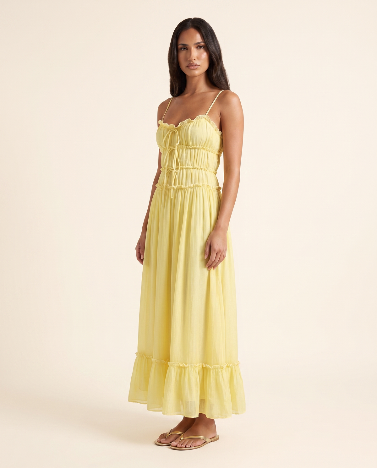 Kovelle yellow frill maxi three quarter view, on model
