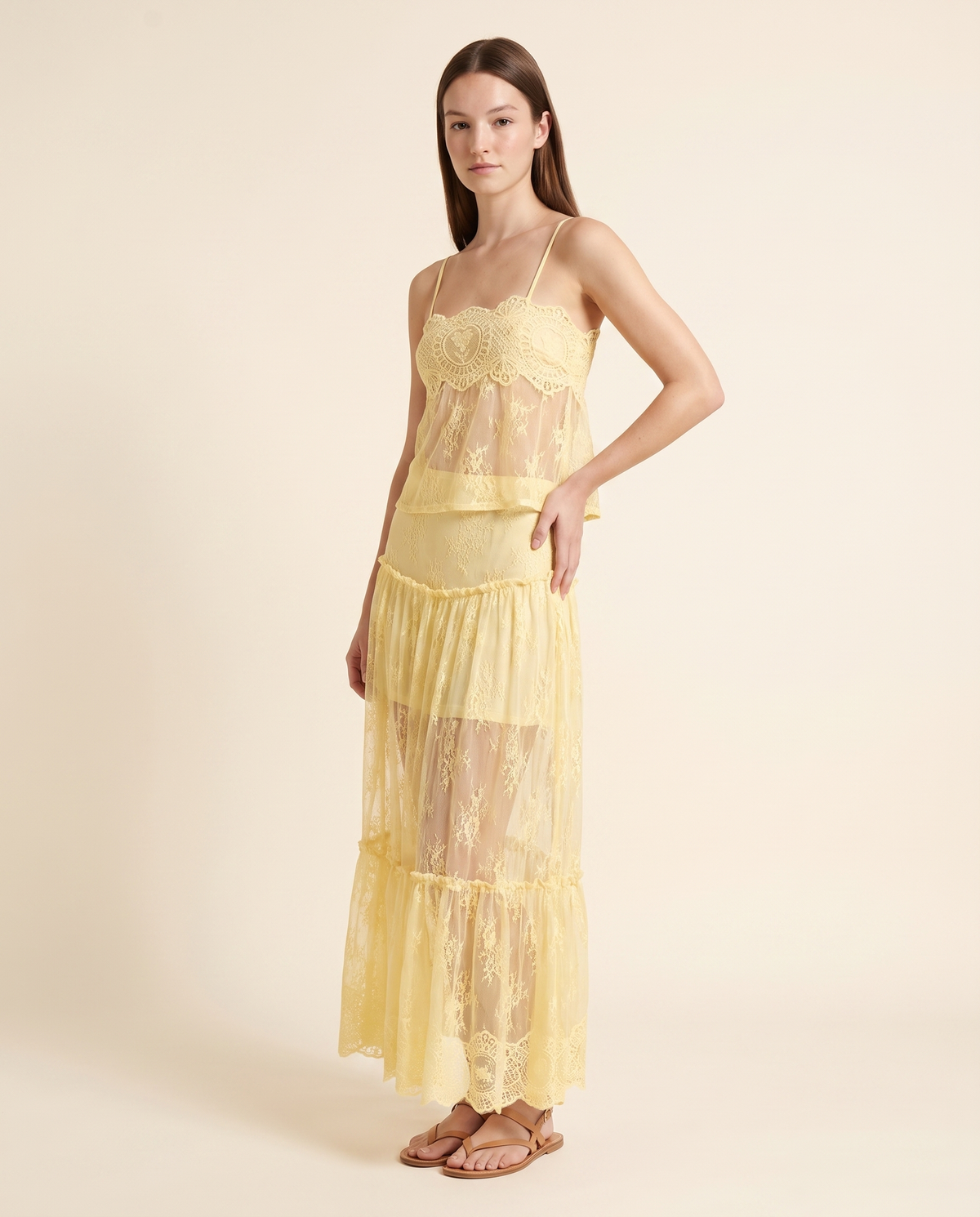 Kovelle yellow lace cami and skirt three quarter view, on model