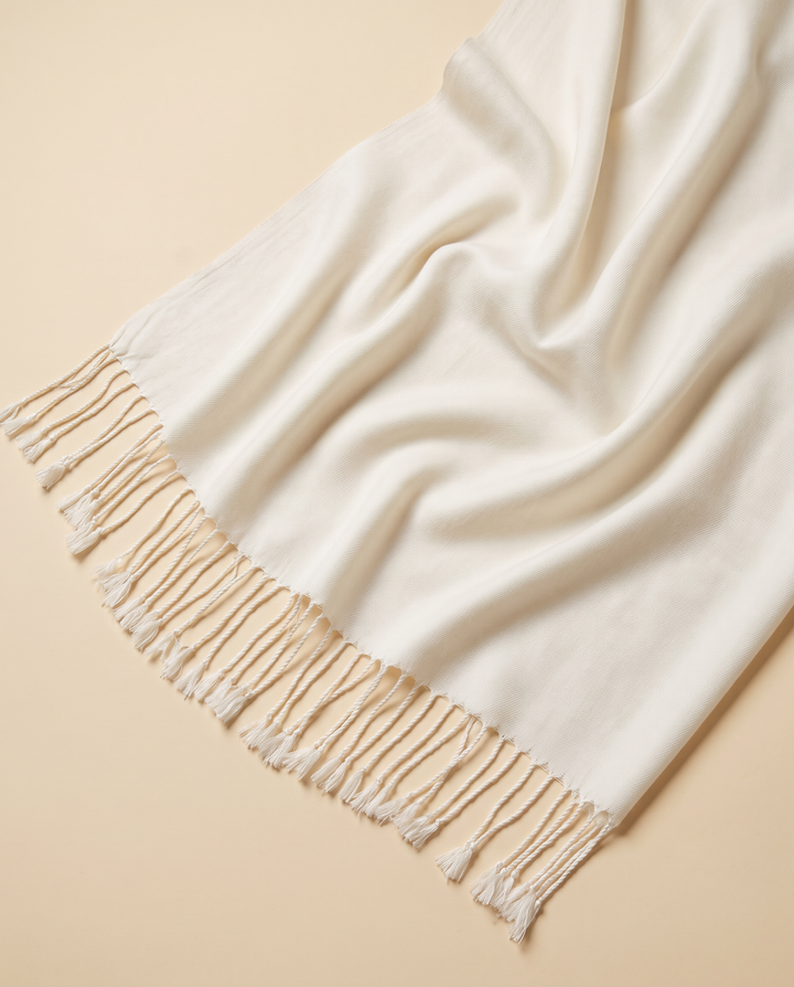 Ivory pashmina tassel detail, close up